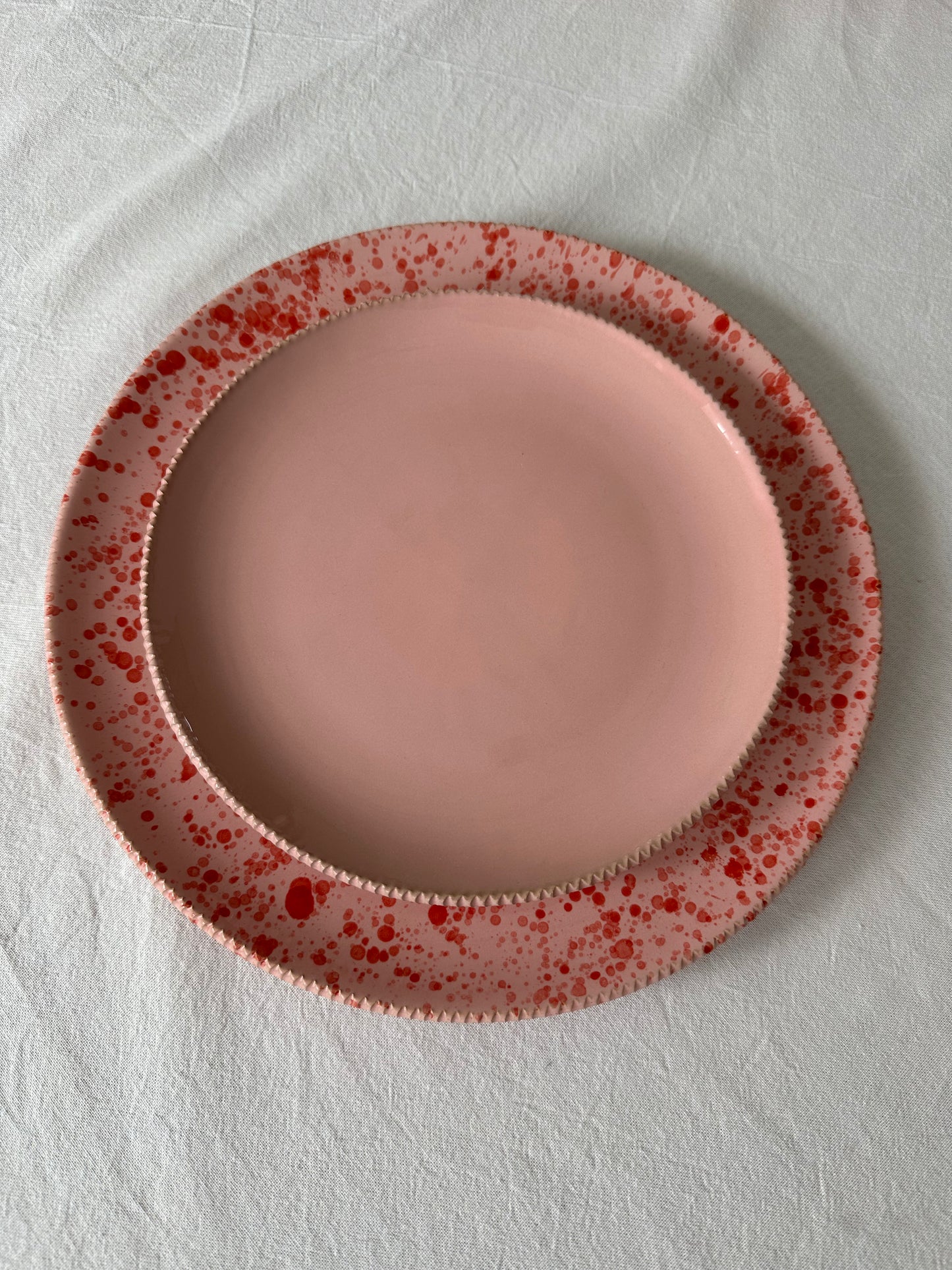 Dinerbord Bella roze/rood gespetterd