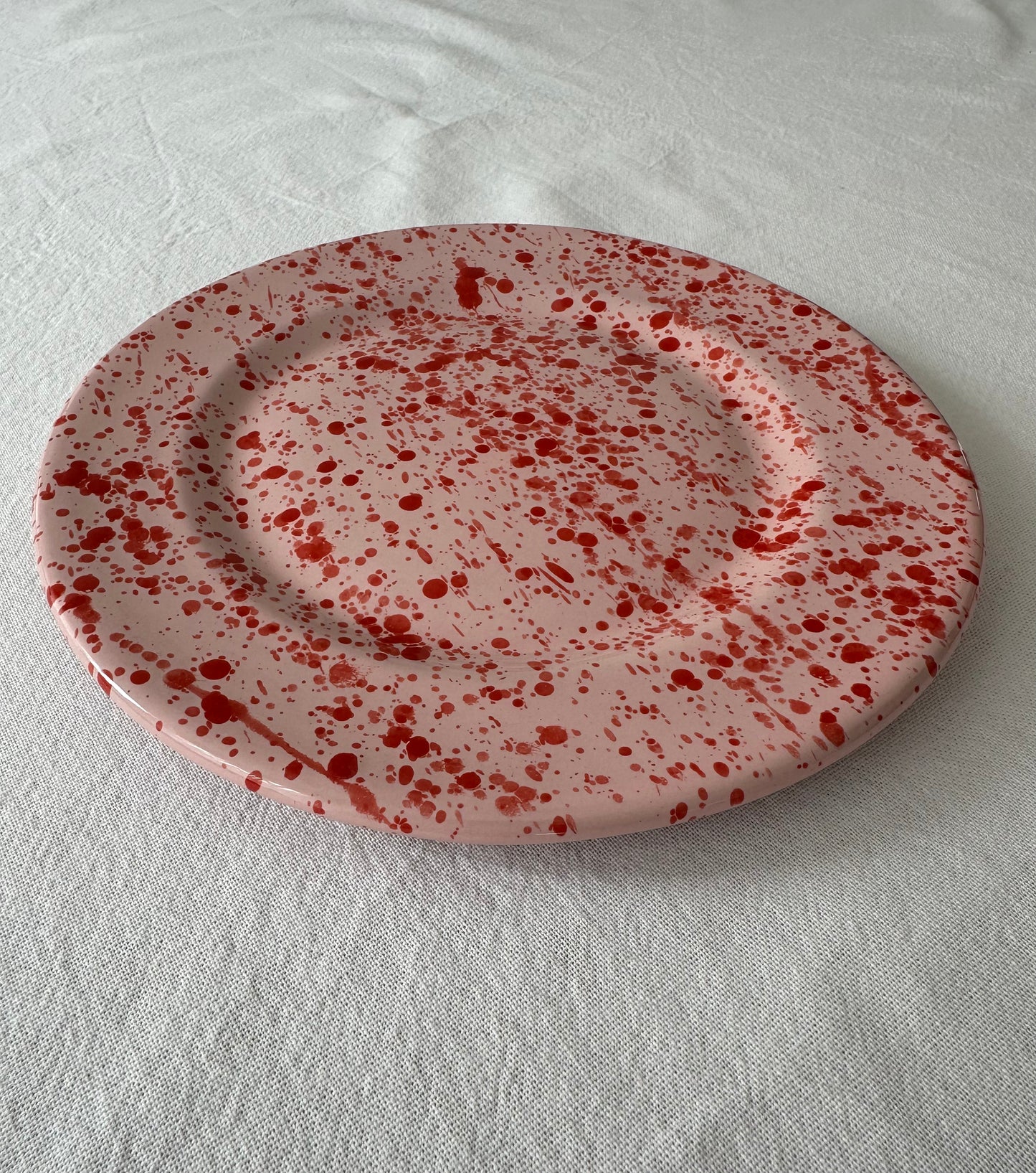 Onbijtbord roze/rood gespetterd